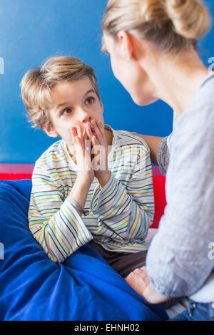 8 year old boy with his mother. Stock Photo