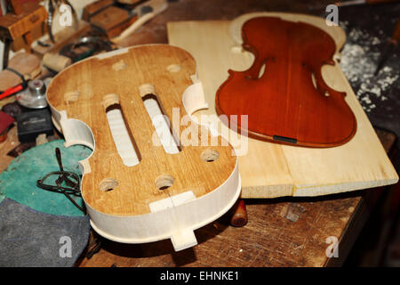 An instrument being made in the workshop of master violin maker Stefano Conio in Cremona, Italy. Stock Photo