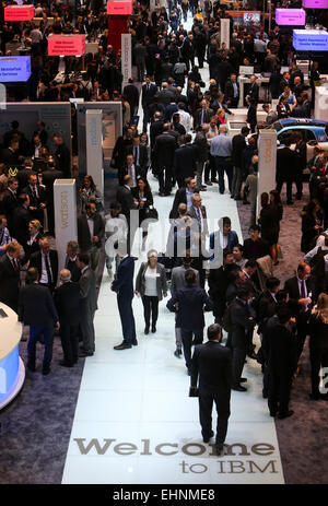 Hanover, Germany. 16th Mar, 2015. Visitors are seen at the IBM's stand at 2015 CeBIT Technology Trade fair in Hanover, Germany, on March 16, 2015. Top IT business fair CeBIT 2015, which features a strong Chinese presence, opened on Sunday in Germany. Credit:  Zhang Fan/Xinhua/Alamy Live News Stock Photo