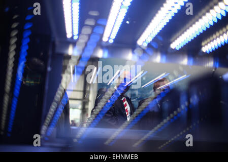 Hanover, Germany. 16th Mar, 2015. Visitors walk around at the IBM's stand at 2015 CeBIT Technology Trade fair in Hanover, Germany, on March 16, 2015. Top IT business fair CeBIT 2015, which features a strong Chinese presence, opened on Sunday in Germany. Credit:  Zhang Fan/Xinhua/Alamy Live News Stock Photo