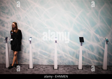 Hanover, Germany. 16th Mar, 2015. A staff member rests at the IBM's stand at 2015 CeBIT Technology Trade fair in Hanover, Germany, on March 16, 2015. Top IT business fair CeBIT 2015, which features a strong Chinese presence, opened on Sunday in Germany. Credit:  Zhang Fan/Xinhua/Alamy Live News Stock Photo