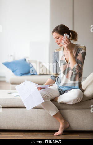Woman reading medical analysis results. Stock Photo