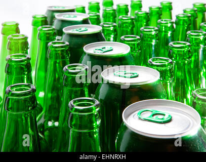 Empty glass beer bottles and cans Stock Photo