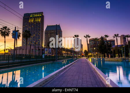 Skyscrapers and the Children's Pond at sunset, in San Diego, California. Stock Photo