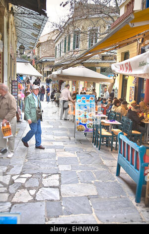 The Plaka district in Athens is a popular shopping and dining area for tourists with quaint alleys and streets. Stock Photo