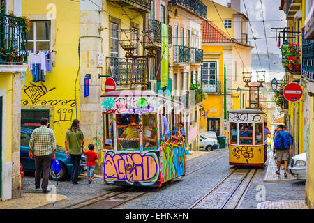 Pedestrians and trams in Lisbon. Stock Photo