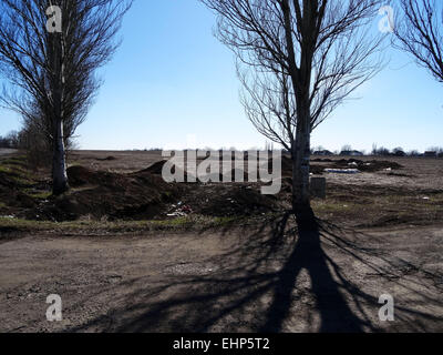 Exit from Ilovaysk in Mnogopillja. Damaged entry sign. 16th Mar, 2015. Caught in August 2014 Ilovaysk turned pro-Russian militants staging post of weapons and ammunition. According to the press center of the Ministry of Defense of Ukraine March 16, 2015 from Russia arrived in the city of 16 wagons of ammunition. © Igor Golovniov/ZUMA Wire/Alamy Live News Stock Photo