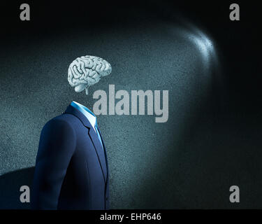 Businessman without head just with sketched brain Stock Photo