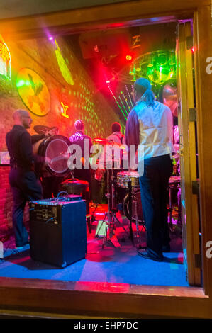 Austin, Texas. 15th Mar, 2015. Looking into the window of The Bat Cave Bar on 6th street in Austin Texas USA. To see live music being played for SXSW 2015. Credit:  Jon-Paul Jones/Alamy Live News Stock Photo