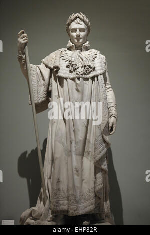 Napoleon Bonaparte in coronation robes (1813). Marble statue by French sculptor Claude Ramey on display in the Louvre Museum in Paris, France. Stock Photo