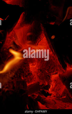 glowing embers in hot red color Stock Photo