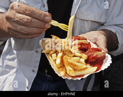 Currywurst with french fries Stock Photo