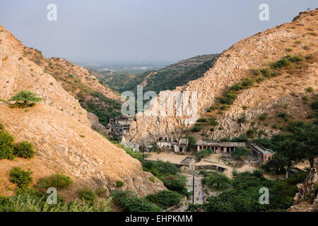 View of the valley leading from Surya Mandir (Temple Of The Sun God) down to Galta (The Monkey Temple) in Jaipur Stock Photo
