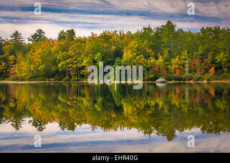 Early autumn reflections at Toddy Pond, near Orland, Maine Stock Photo ...