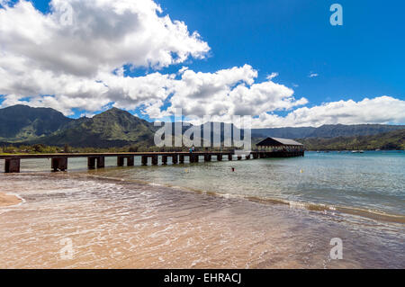 Kauai, HI, USA - August 31, 2013: tourists on Pier and bathing in Hanalei Bay, Kauai Island (Hawaii) Stock Photo