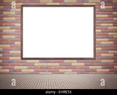 Black wooden frame with copy space hanging on gray brick wall near the street. Stock Photo