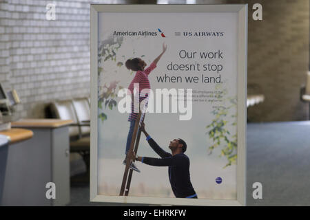 American Airlines and US Airways poster at Memphis International Airport, Tennessee USA Stock Photo