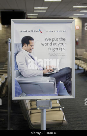 American Airlines and US Airways poster at Memphis International Airport, Tennessee USA Stock Photo