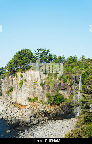Asia, Republic of Korea, South Korea, Jeju island, Seogwipo city, Jeongbang waterfall cascading into the sea Stock Photo