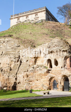 Nottingham Castle and Castle Rock in which some of the caves are visible, seen from Brewhouse Yard, Nottingham, England, UK Stock Photo