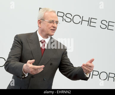 Stuttgart, Germany. 17th Mar, 2015. Chief Executive Officer of the Porsche SE Martin Winterkorn stands in front of the logo of the company during the balance press conference in Stuttgart, Germany, 17 March 2015. Photo: BERND WEISSBROD/dpa/Alamy Live News Stock Photo