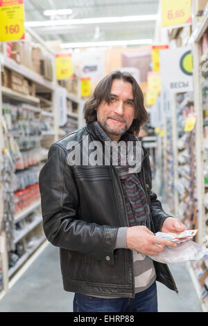 Portrait of  middle-aged man in a store building materials Stock Photo