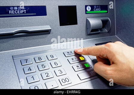 ATM - entering pin close up Stock Photo