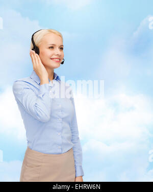 friendly female helpline operator Stock Photo