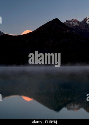 Herbert Lake with Mt. Temple reflection and sunrise. Banff National Park, Alberta, Canada Stock Photo