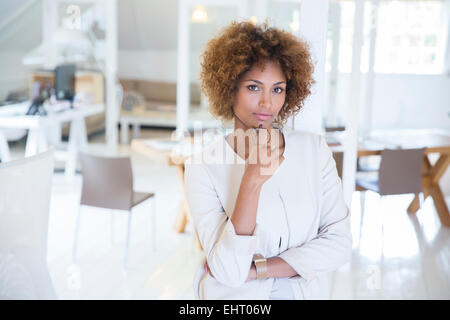 Portrait of young smiling office worker Stock Photo