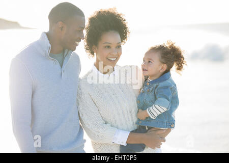 Portrait of happy family in sunlight Stock Photo