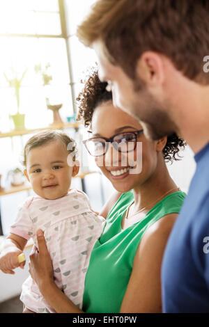 Portrait of parents with baby daughter Stock Photo