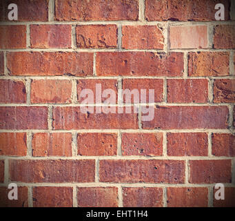 Retro filtered background made of old bricks. Stock Photo