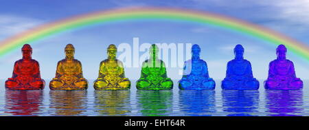 Seven small buddhas in chakra colors meditating under rainbow and upon water by day - 3D render Stock Photo