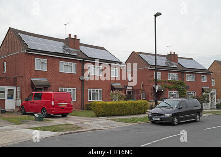 Solar panels on the roof of several residential homes in Greenford, Middx,UK. Stock Photo