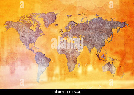 World Population Concept, Earth shaped crack in Yellow wall and silhouettes of people. Stock Photo