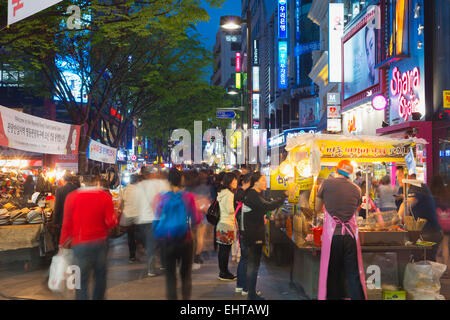 Asia, Republic of Korea, South Korea, Seoul, neon lit streets of Myeong-dong