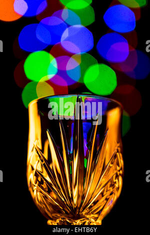 Light bubbles coming out of a wine glass Stock Photo