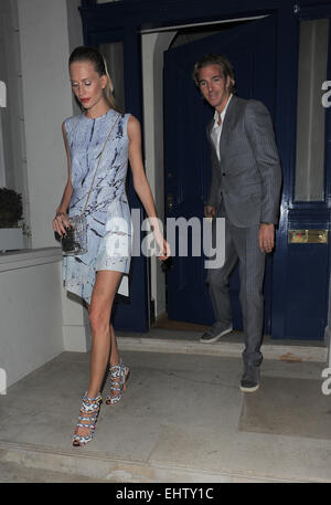Poppy Delevingne and her husband James Cook spotted leaving their home in Belgravia, London Featuring: Poppy Delevingne,James Cook Where: London, United Kingdom When: 12 Sep 2014 Stock Photo