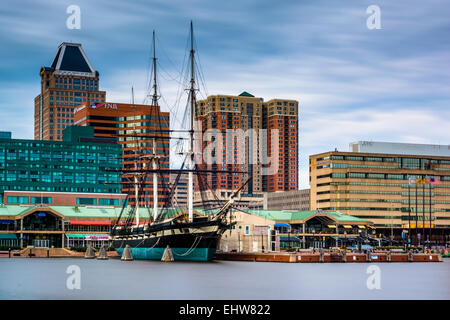 Long exposure of the USS Constellation and buildings at the Inner Harbor, in Baltimore, Maryland. Stock Photo