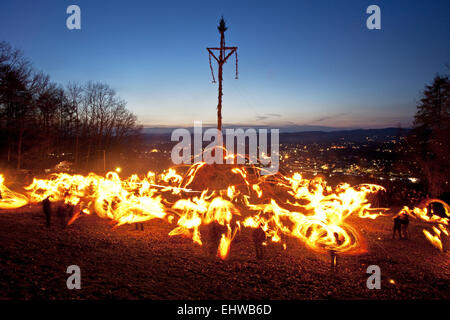 Torch swinging on Easter fire in Attendorn. Stock Photo
