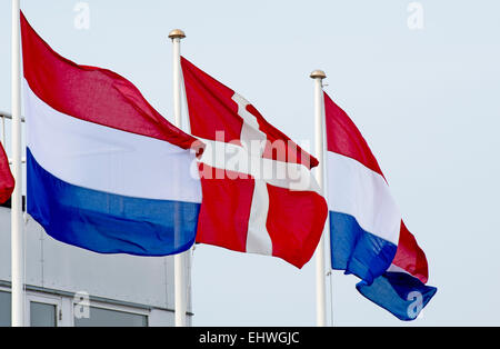 Copenhagen, Denmark. 17th Mar, 2015. Dutch and Danish flags are hoisted for the arrival of the Dutch royal couple at the airport Kastrup in Copenhagen, Denmark, 17 March 2015. The King and Queen of The Netherlands are in Denmark for an two day state visit. Photo: Patrick van Katwijk/ POINT DE VUE OUT - NO WIRE SERVICE -/dpa/Alamy Live News Stock Photo