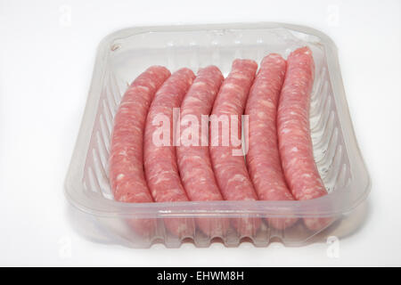 Spicy pork sausages on the package, isolated on white background Stock Photo