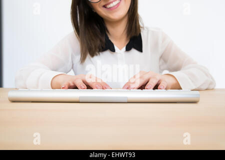 Closeup image of a female hands using keyboard Stock Photo