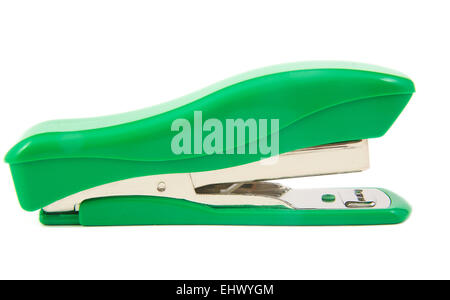 Green stapler on a white background Stock Photo