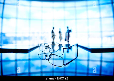 Close-up of glasses on office table Stock Photo