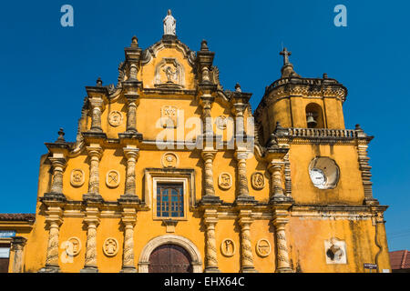 Mexican-style baroque facade of the Iglesia de la Recoleccion church (1786) in this historic NW city; Leon, Nicaragua Stock Photo