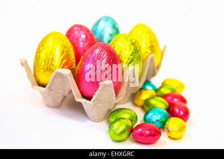 Festivals, Religious, Easter, Multi coloured choclate eggs in carton. Stock Photo