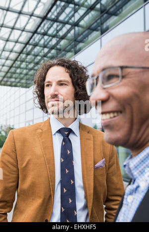 Close up portrait African businessman Caucasian Stock Photo