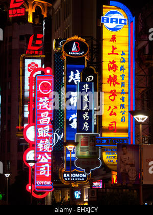 Neon signs on Nanjing Road busy shopping street, Shangai, China Stock Photo